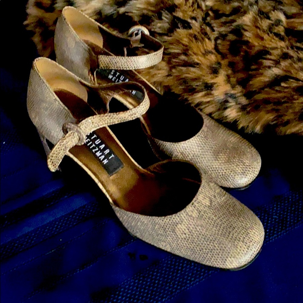 Strapped snakeskin heels